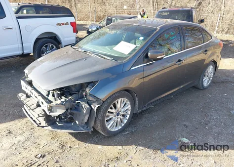 2015 Ford Focus Titanium from USA, damaged, VIN 1FADP3J27FL259029